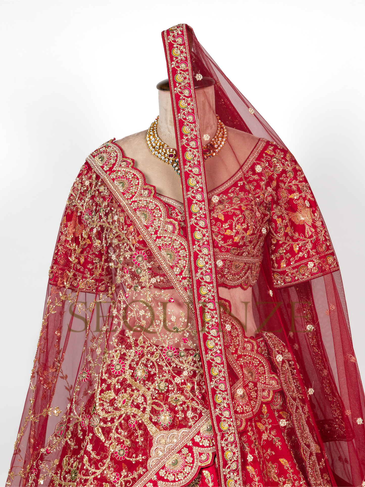 Crimson Peacock Bridal Couture