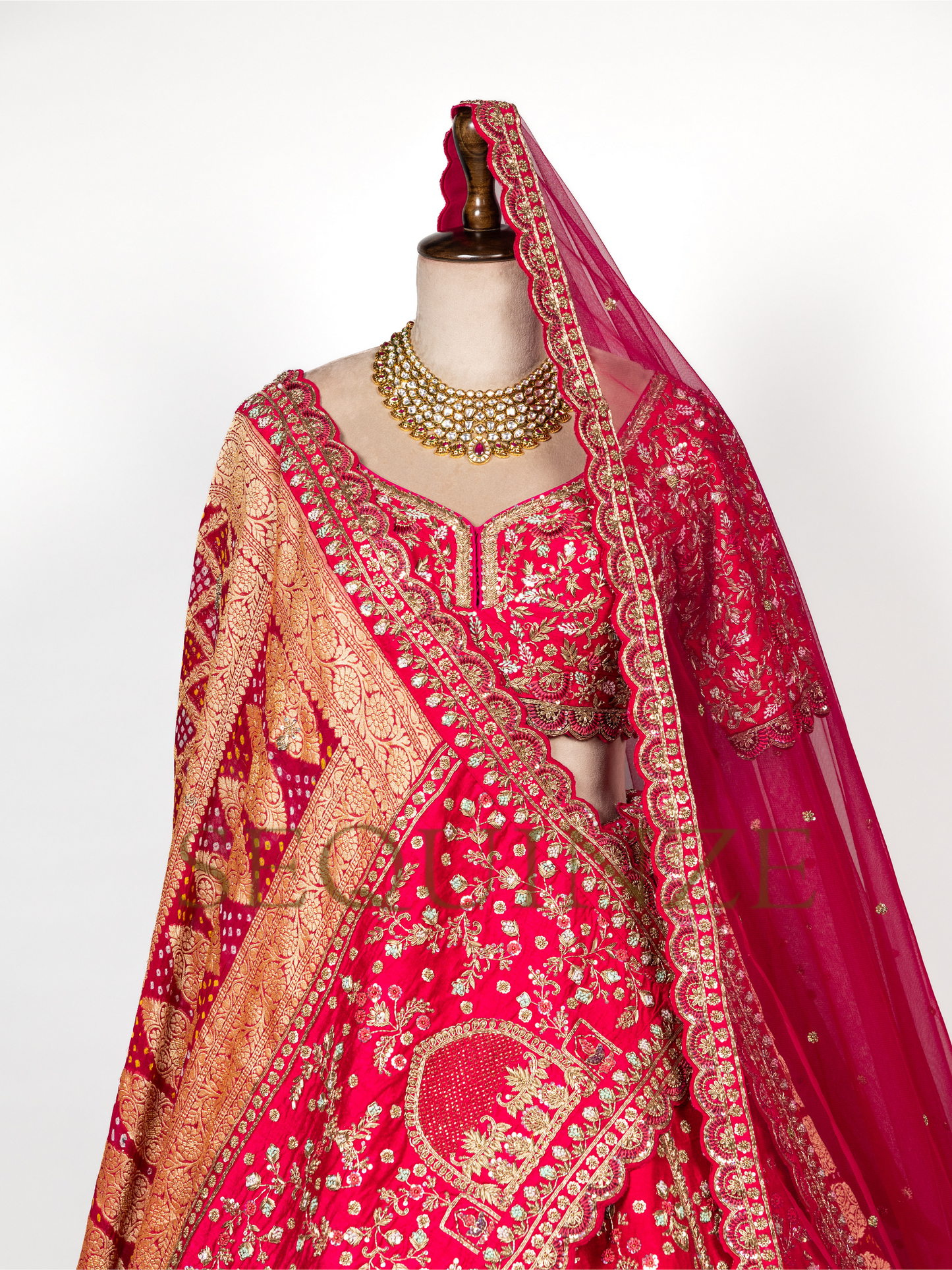 Crimson Peacock Bridal Couture