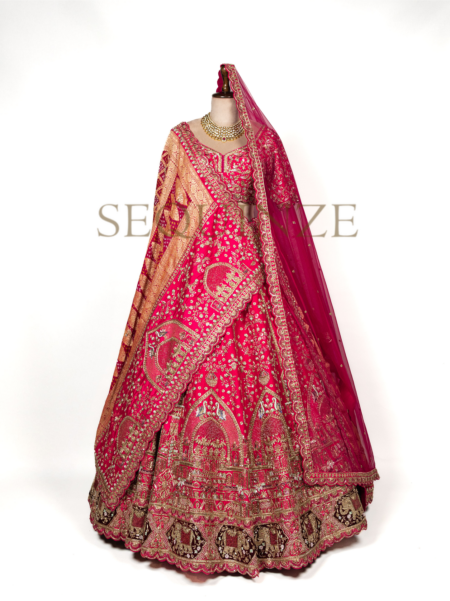 Crimson Peacock Bridal Couture