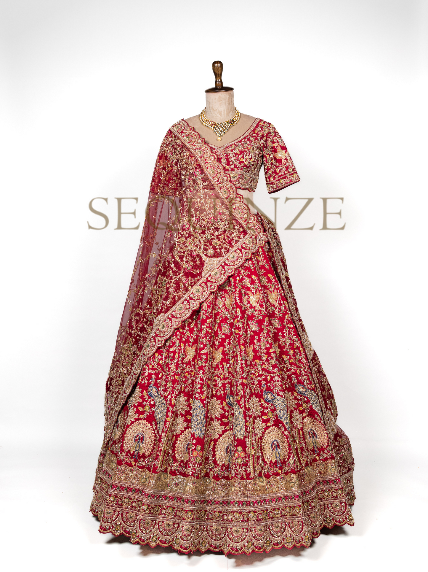 Crimson Peacock Bridal Couture