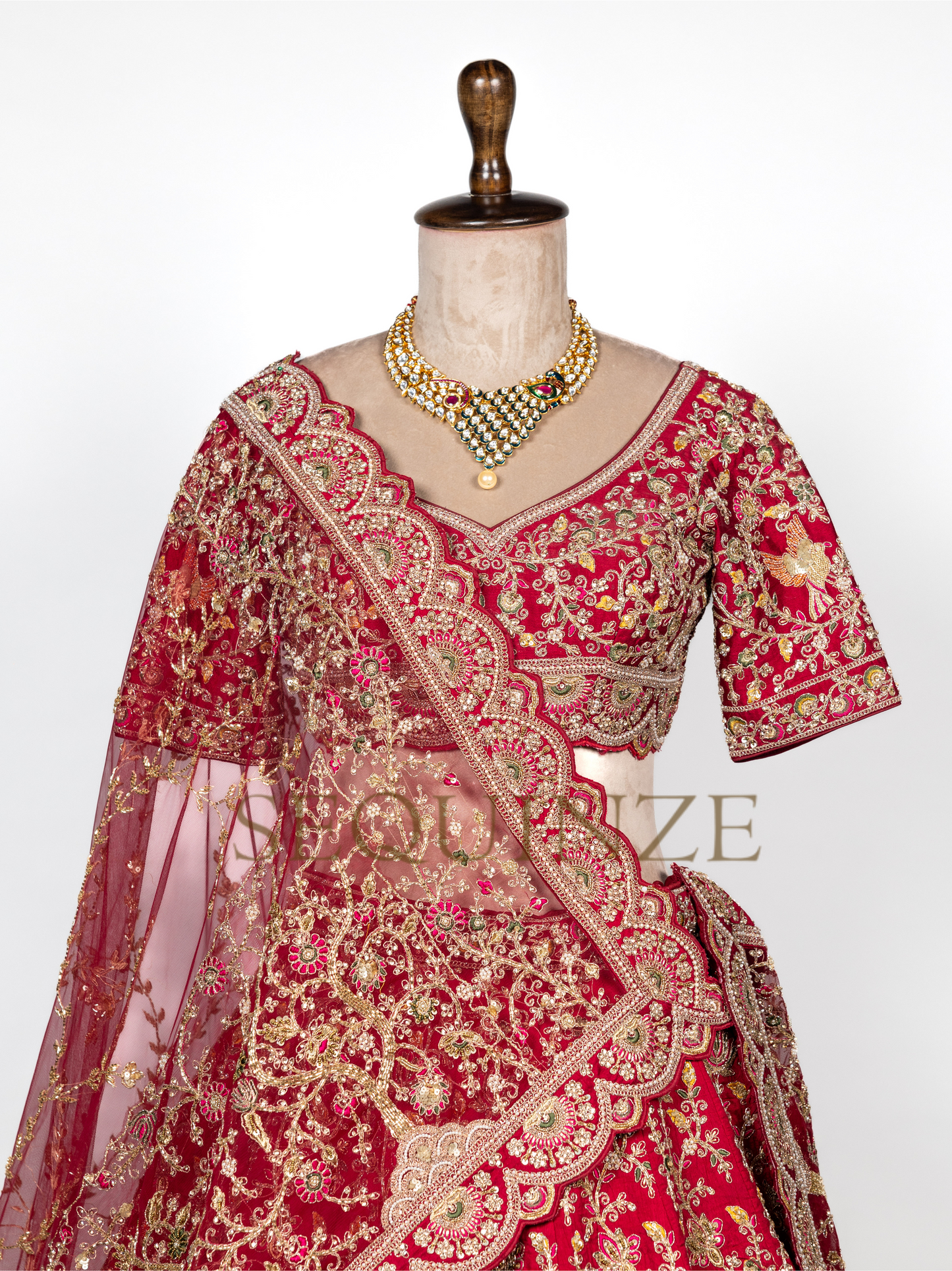 Crimson Peacock Bridal Couture