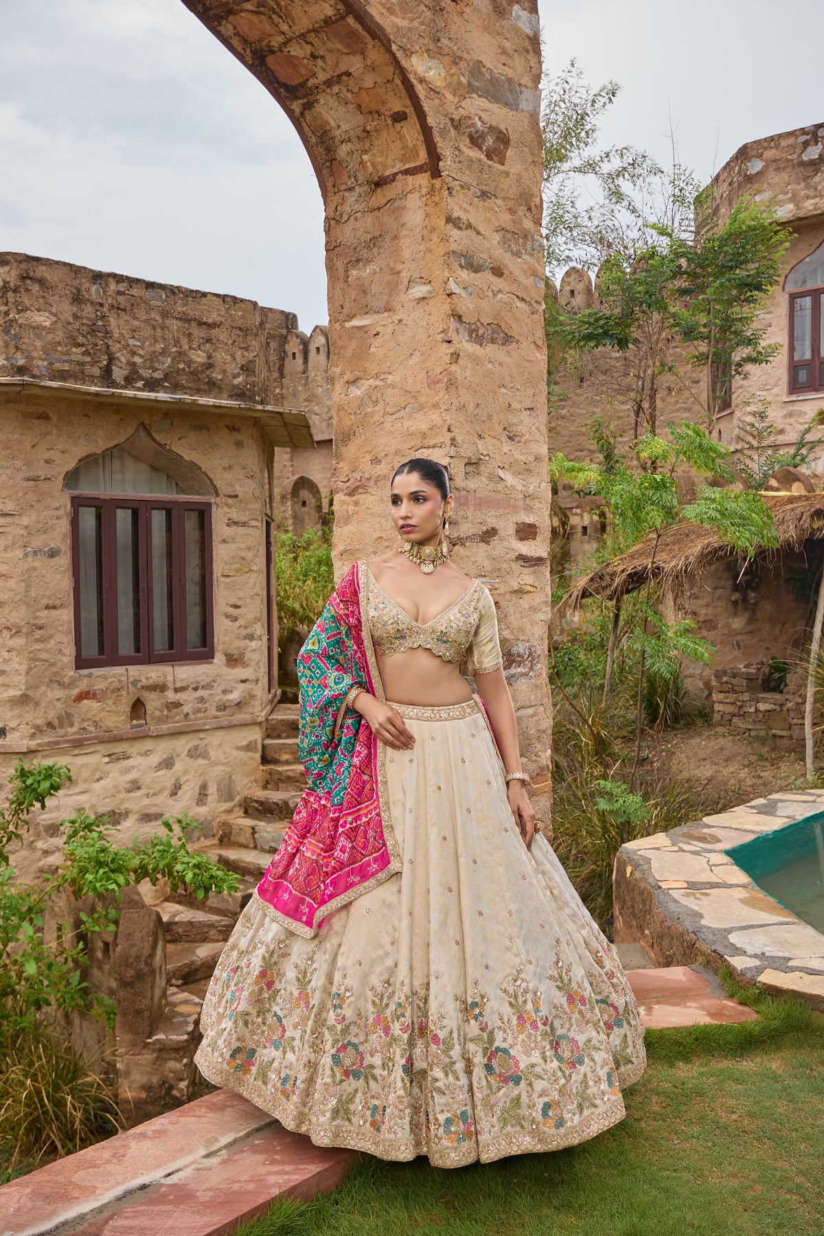 Maitri ivory lehenga, floral hem embroidery