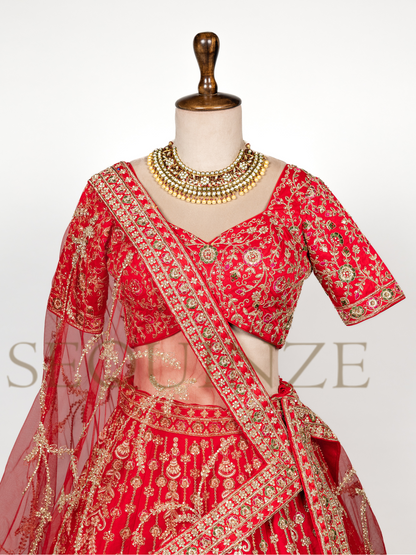 The Regal Red Peacock Bridal Collection