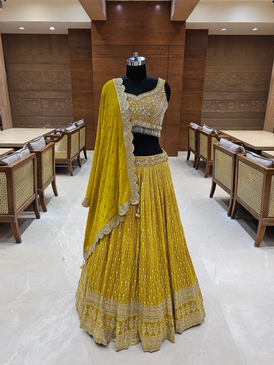 Yellow Pleated Lehenga with Designer Blouse