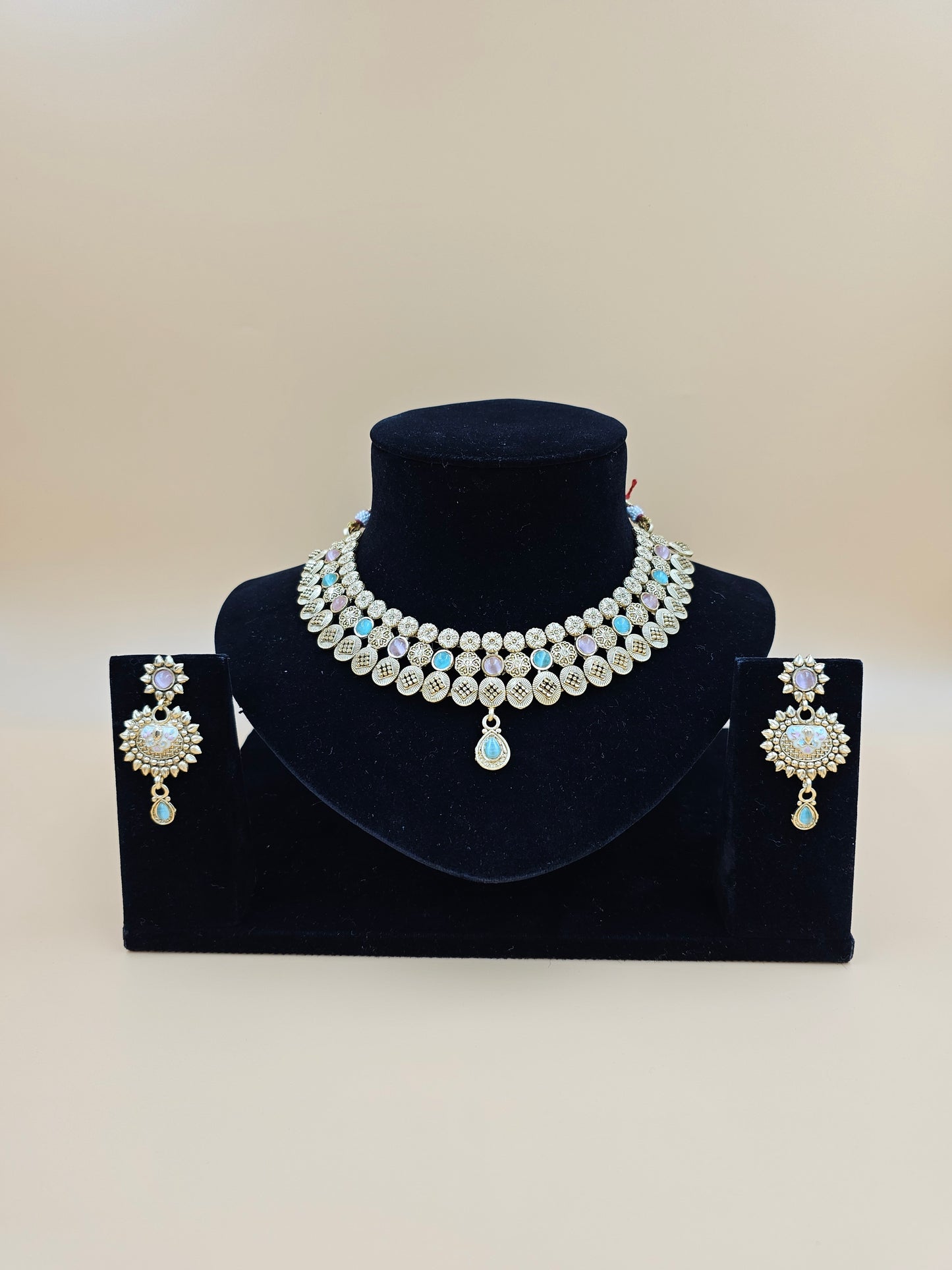 Elegant Gold-Tone Necklace Set with Pink and Blue Stones