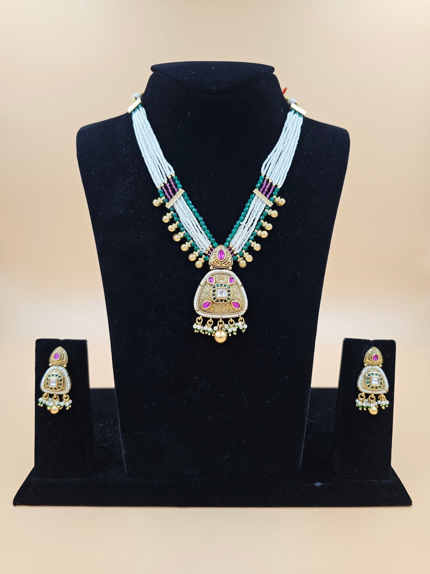 Pearl and Kundan Necklace Set with Green Accents