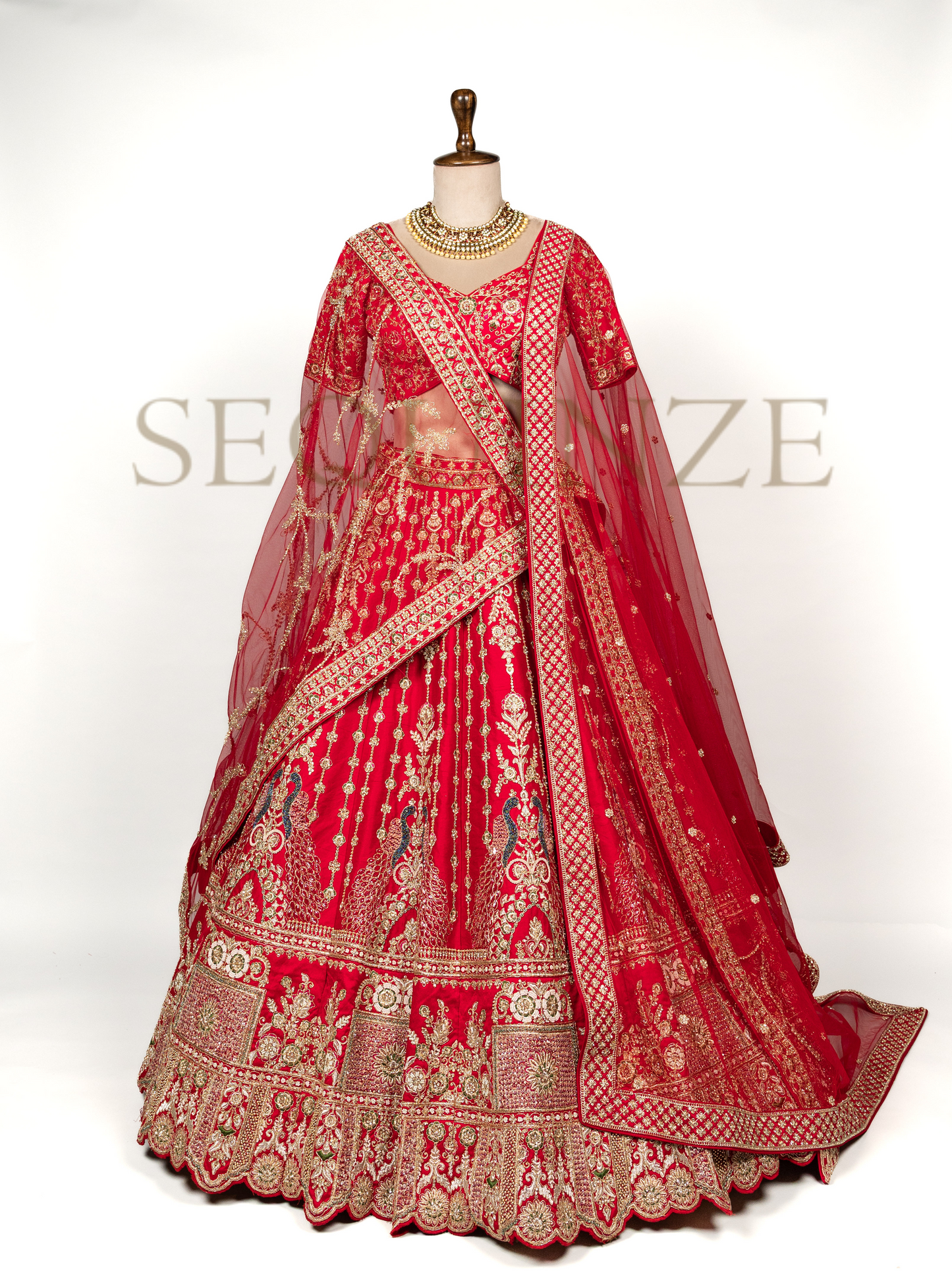The Regal Red Peacock Bridal Collection