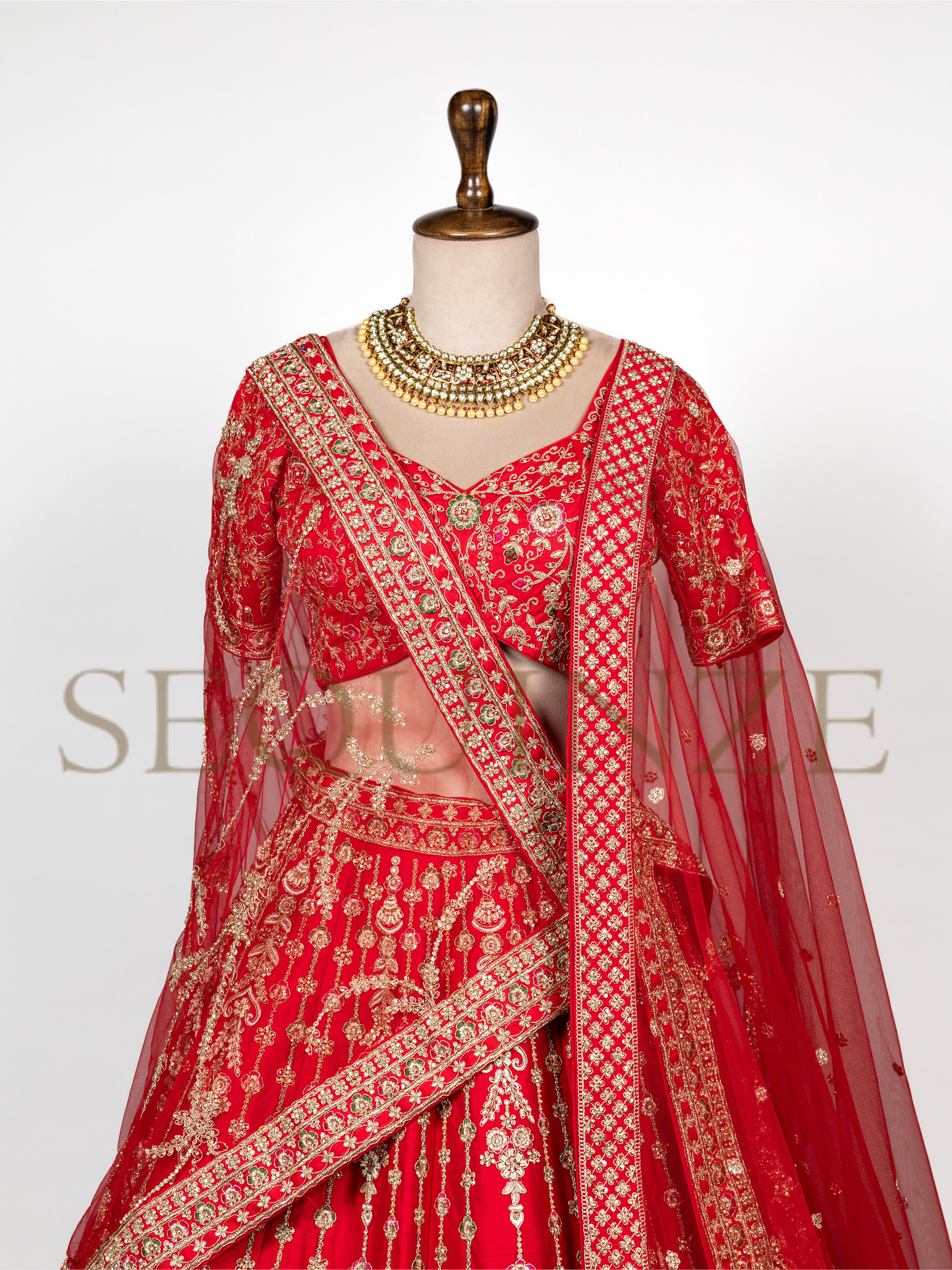 The Regal Red Peacock Bridal Collection