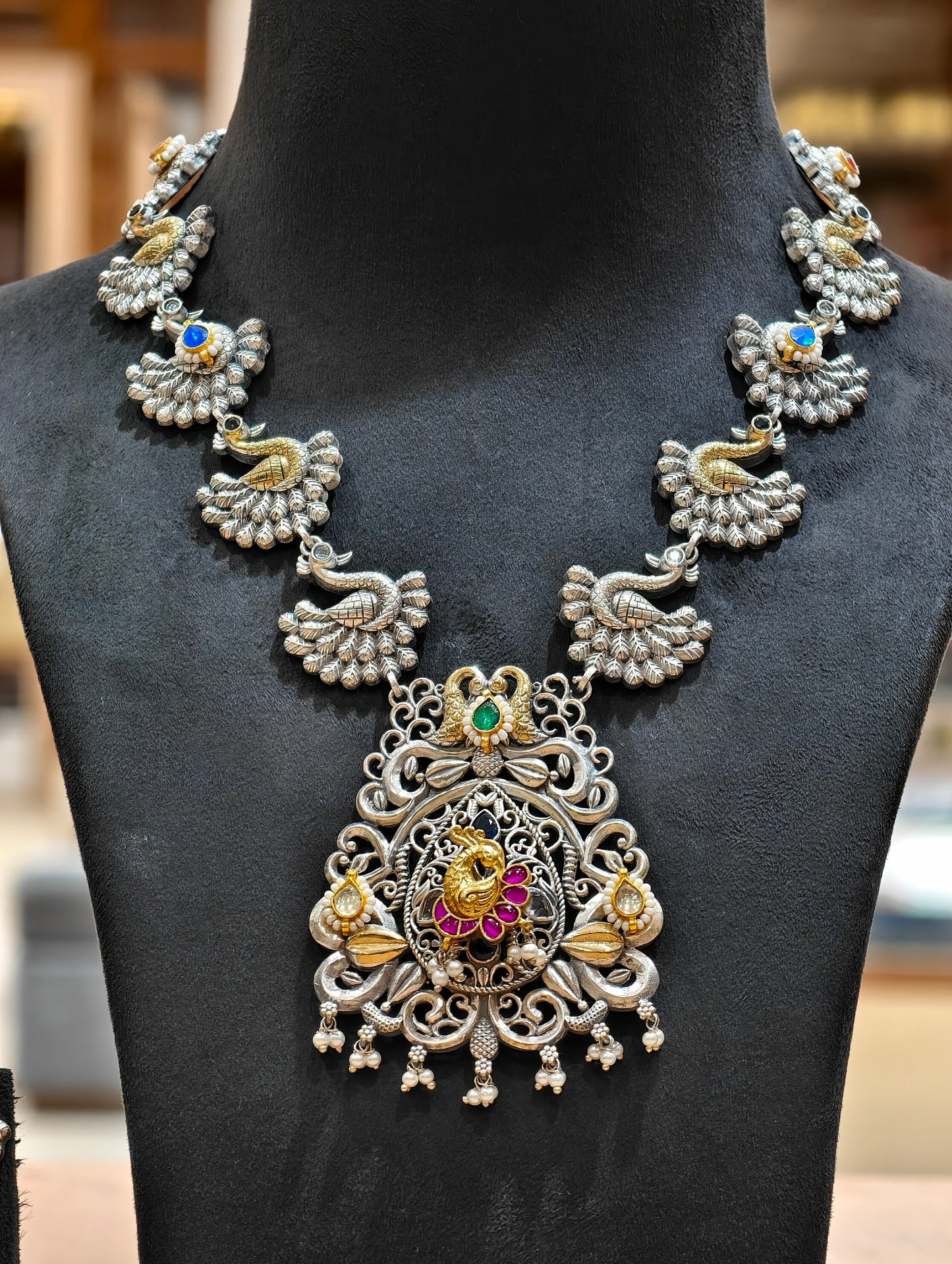 Peacock & Pearl
