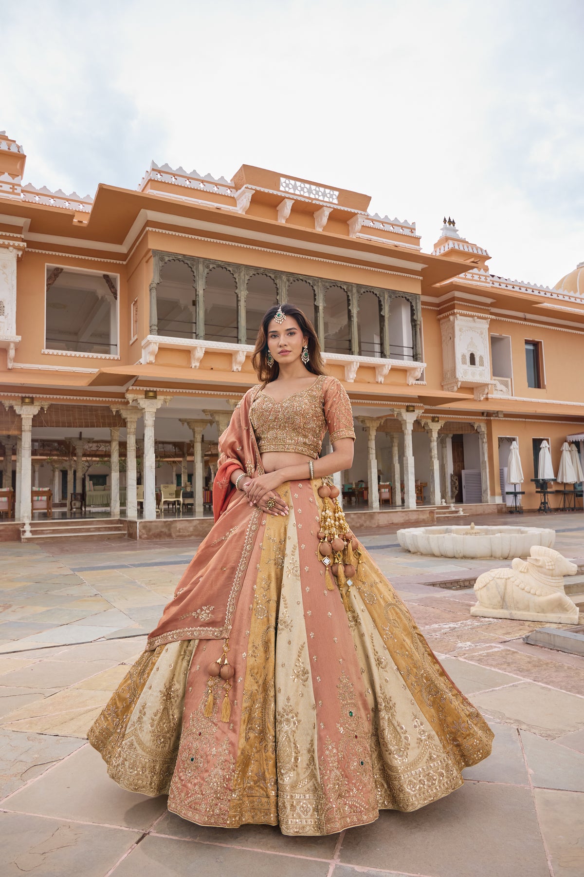 Paridhi peach and mustard panelled lehenga set, full length