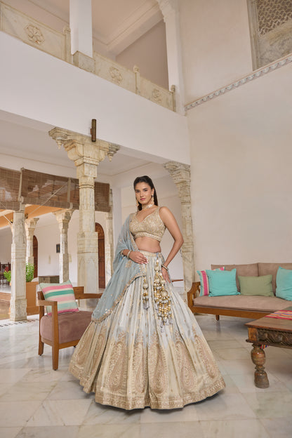Priyanshi powder blue and gold paisley lehenga set, full length with dupatta
