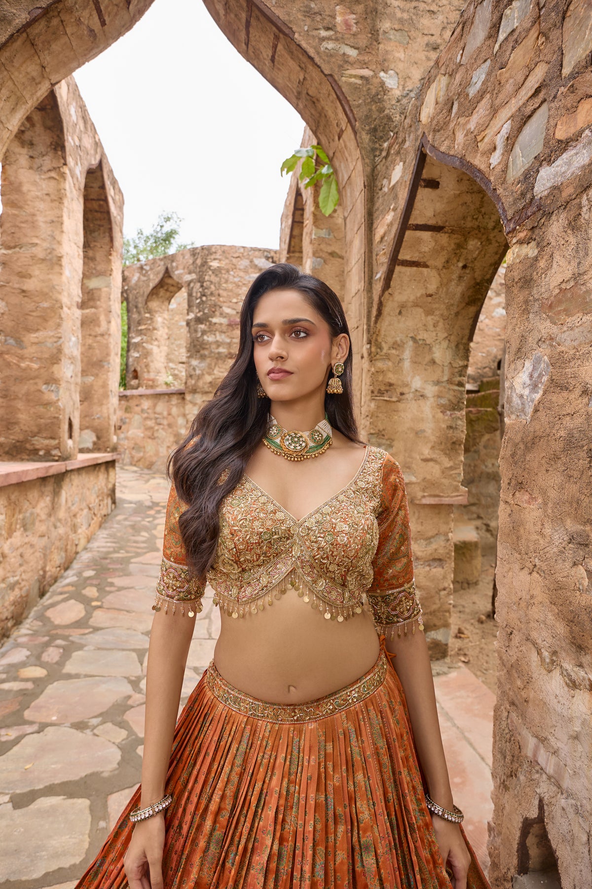 Saubhagya lehenga, zardozi crossover blouse and coin fringe detail