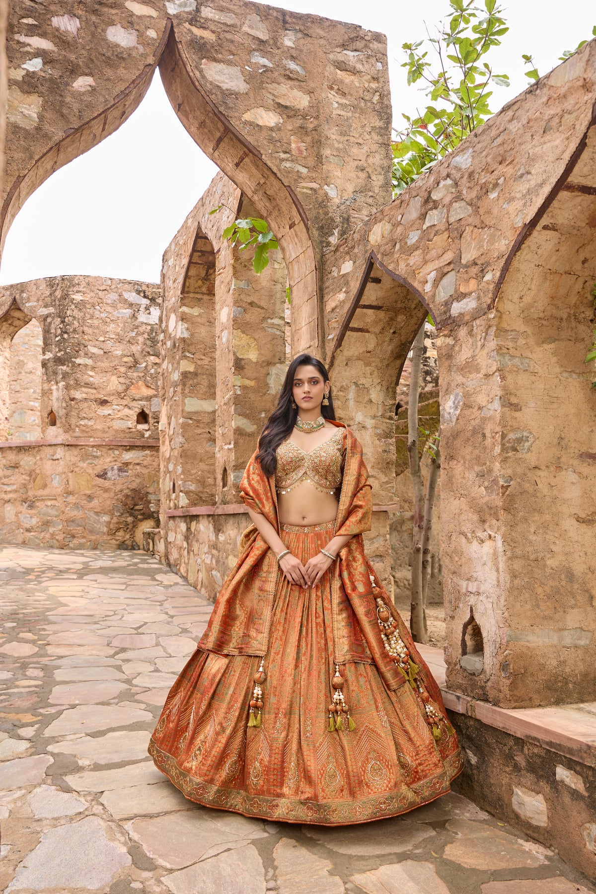 Saubhagya lehenga with woven dupatta over both shoulders